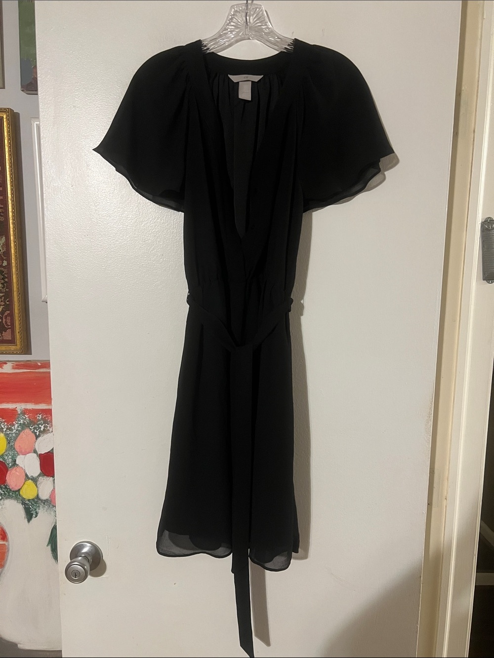 H&M black chiffon flutter sleeve elastic waist with self belt dress. Lined.